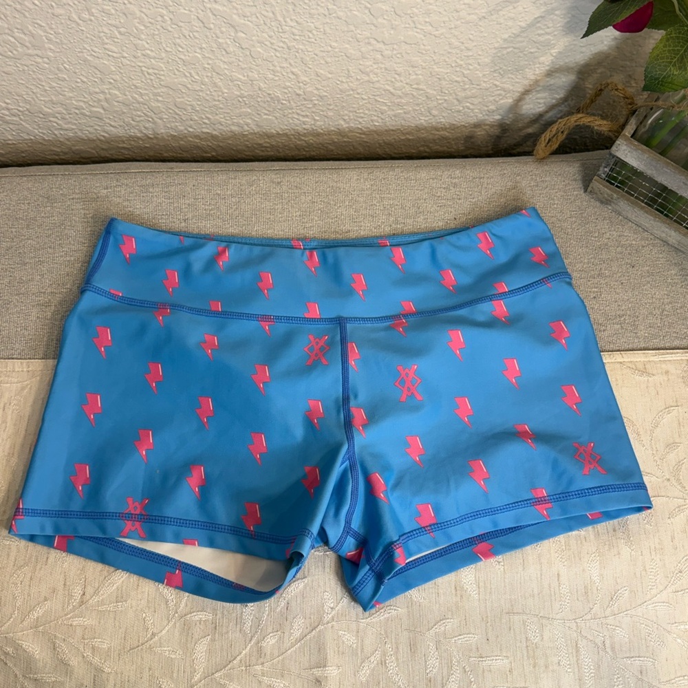 Pillage Athletics Women’s Size XL Short Shorts.‎ Blue with pink Lightning bolts.